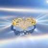 A golden heart-shaped diamond-encrusted ring is a fashionable and simple luxury jewelry accessory for women Application Scenario
